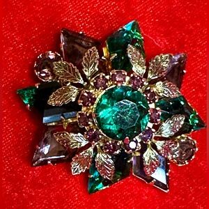 Vintage Rhinestone Brooch green & purple set in gold plated casing.Gently loved.